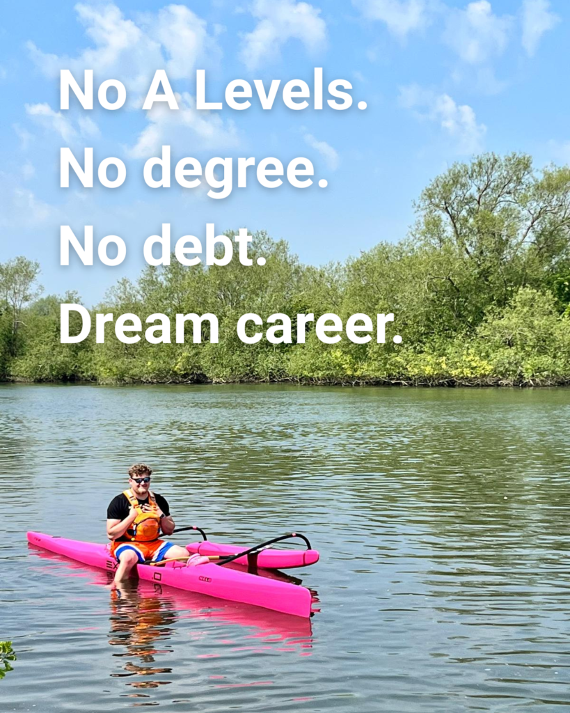 James sat in a pink canoe on the river